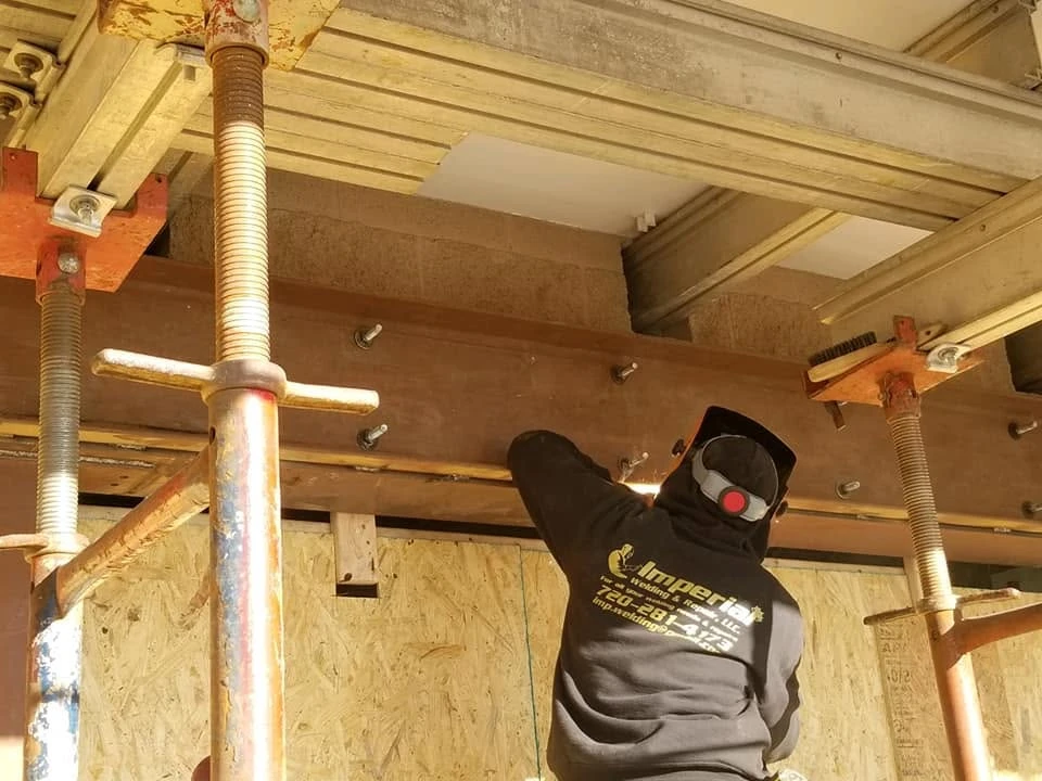 Our Imperial Welding team welding a structural steel beam